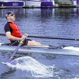 Chris Downey Rowing Chris Downey in a rowboat. Photo by Doug Olson, photographer