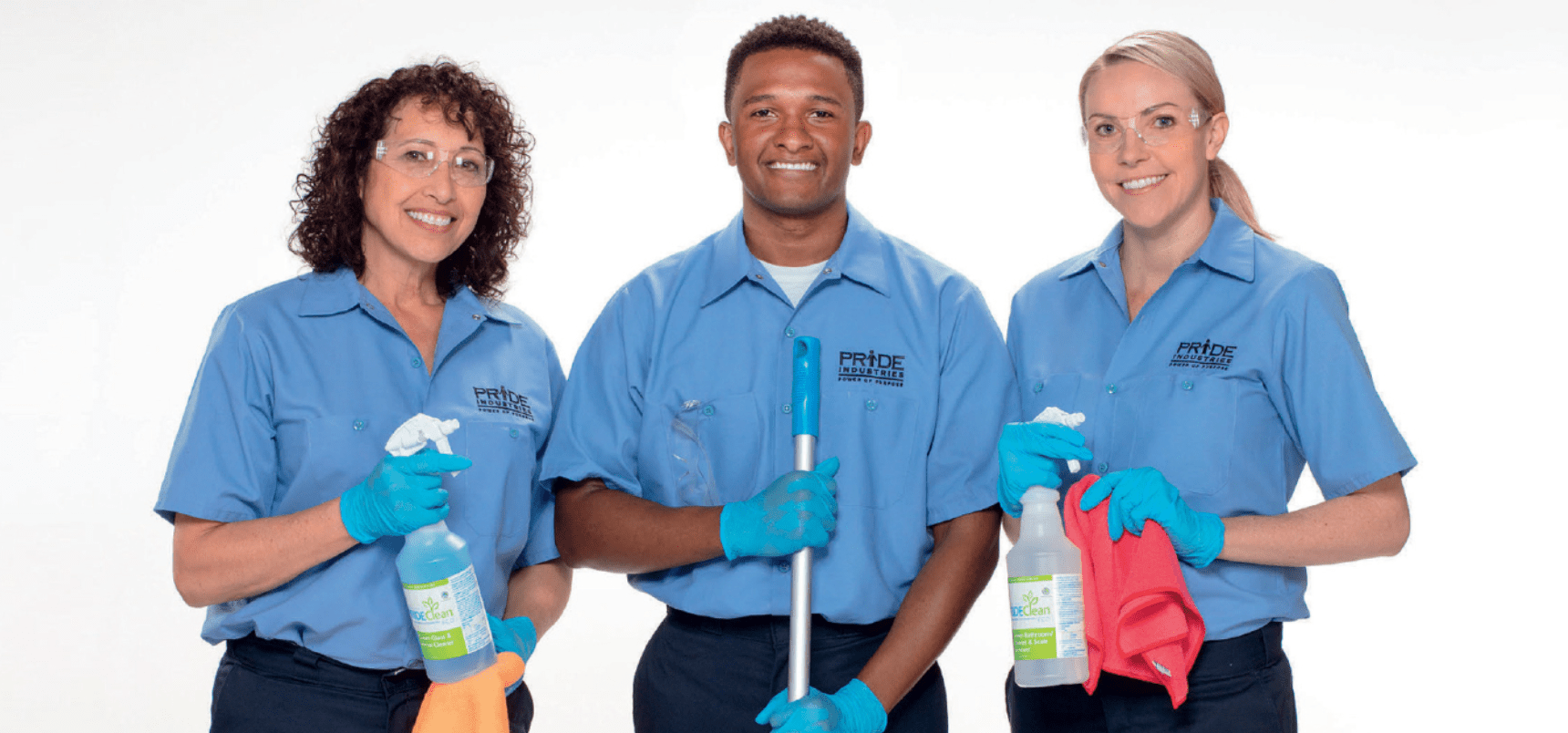 Three people wearing Pride Industries uniforms. The middle one holds the handle of a mope when the two at either end hold PrideClean products