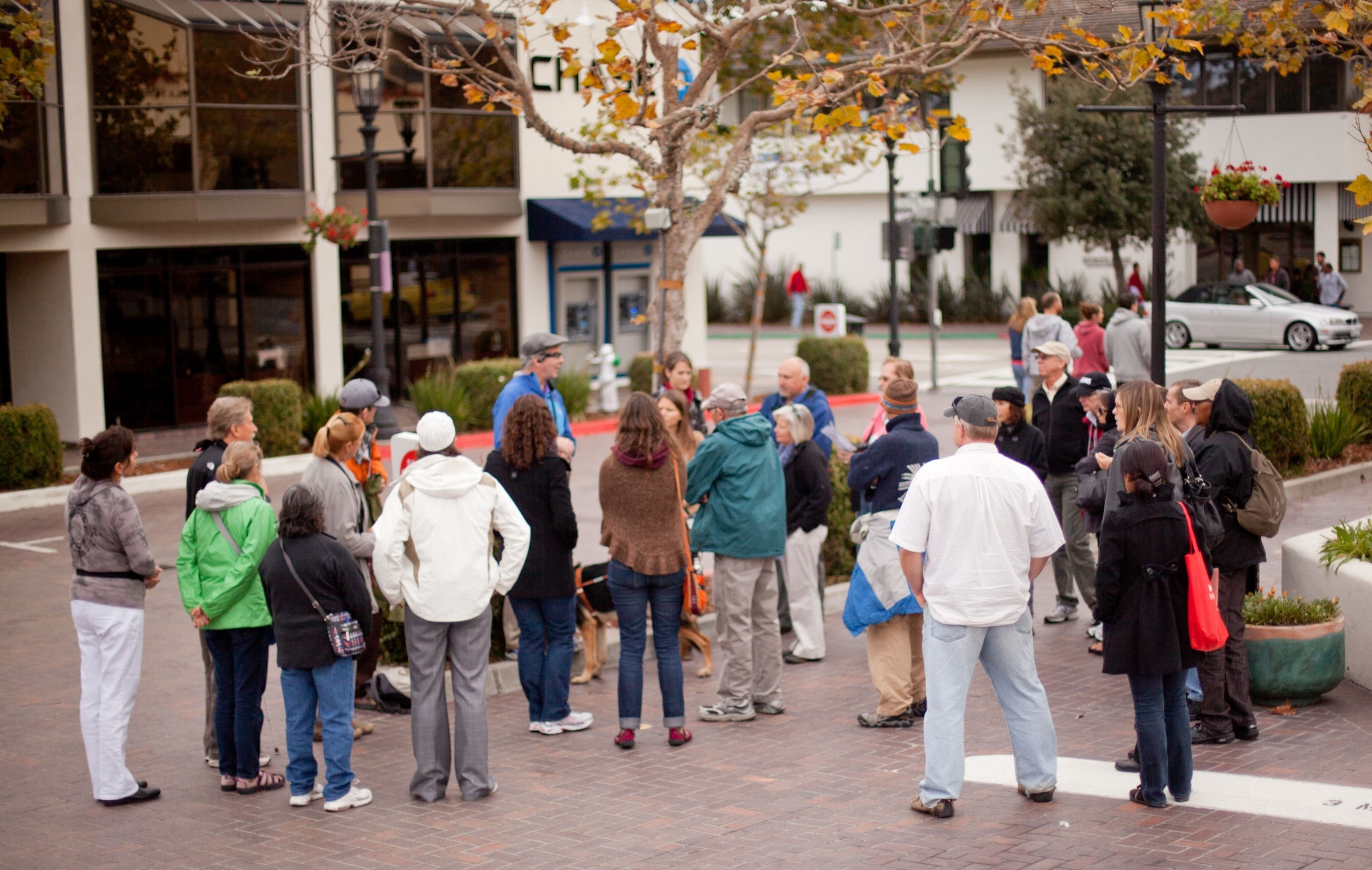 A group of people each using various alternative tools, and techniques to independently navigate their environment.