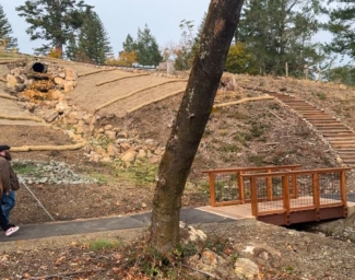 New EHC Director, Jamey Gump, and a visitor walk down a newly paved path at Enchanted Hills.