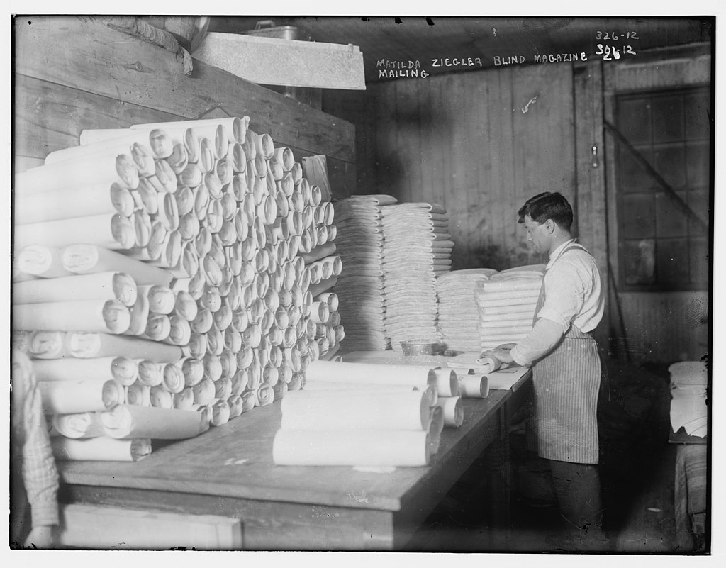 The Braille Matilda Ziegler Magazine for the Blind is assembled and prepared for mailing.